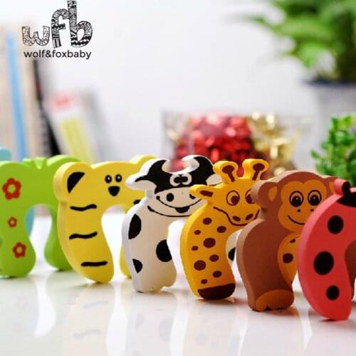 2014 5pcs/pack Free Shipping cute animal designs Baby safety Door Jammer Guard Finger Protector Stoppers