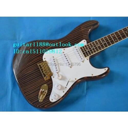 Free shipping new zebra wood single electric guitar with gold hardware made in China 1523