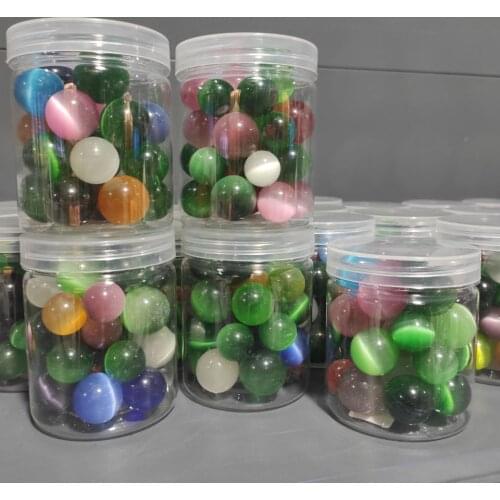 A box Man Made Colorful Cat Eye Crystal Balls Spheres