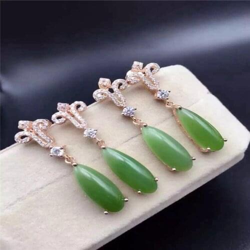 KJJEAXCMY fine jewelry 925 pure silver inlaid with natural hetian jade medulla ladys ear pendant oval ear hook shaped