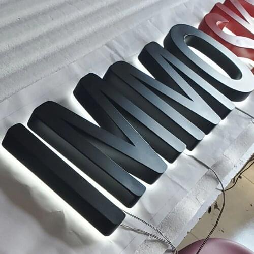 Reverse-lit illuninated painted led channel letter black red modern shopfront