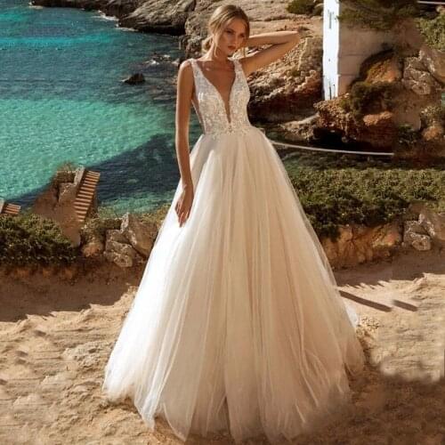 Backless Wedding Dresses A-line V-neck Tulle Appliques Lace Beach Boho Dubai Arabic Wedding Gown Bridal Dress Vestido De Noiva