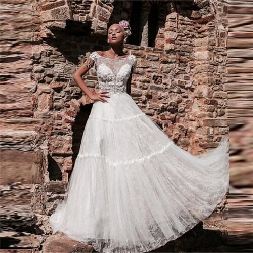 Sexy Scoop Lace A-Line Wedding Dresses Beaded Beach Bridal Gowns Criss Cross Back New Fashion Custom Robe De Mariage Spring