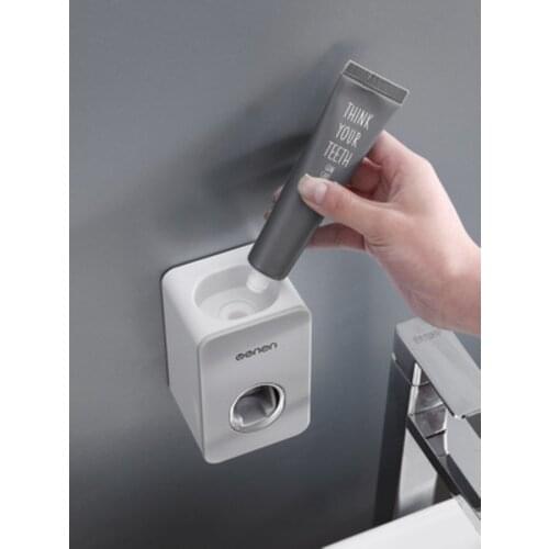 Automatic toothpaste set wall hanging free punch toothpaste toothbrush rack toothpaste rack lazy squeeze artifact