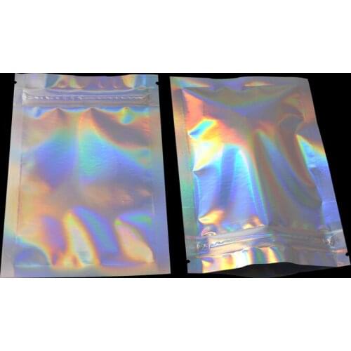 Free shipping 100pcs laser color plastic zip lock pouch foil bags 7.5x10cm and 10x15cm holographic silver zip bag