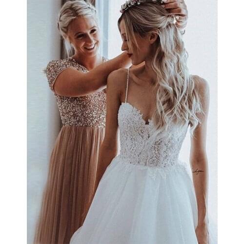 Boho A-line Wedding Dress Spaghetti Straps Appliques Beading Open Back Bridal Dress Chapel Train Elegant Backless Robe De Mariee