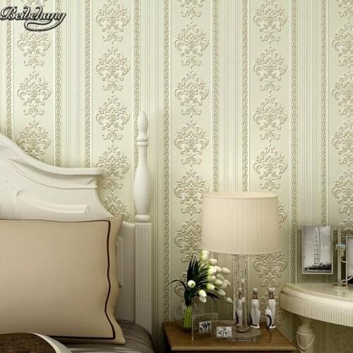 Beibehang Simple non - woven modern vertical striped wallpaper warm bedroom study background wall environmental protection