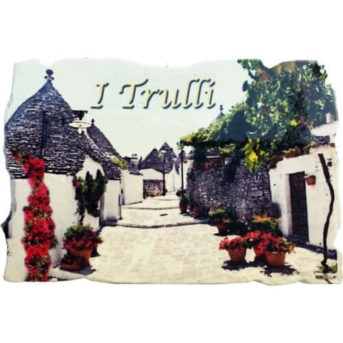 QIQIPP A tiled refrigerator of trulli dome stone houses in the small white Italian town of Pubaya