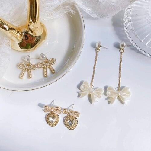 Japan and South Korea jewelry Korea sweet bowknot baroque pearls wind needles new temperament stud earrings
