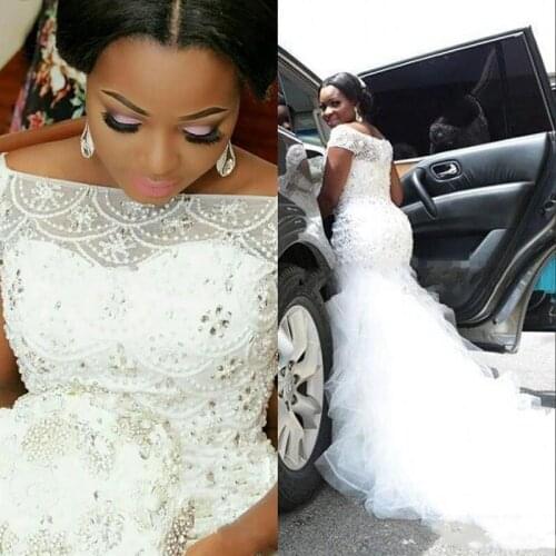 2020 Plus Size African Mermaid Wedding Dresses Beading Pearls Sheer Bateau Neck Ruffled Short Sleeves Bridal Gowns
