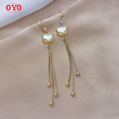 New 925 sexy cats eye stone fox long tassel simple earrings