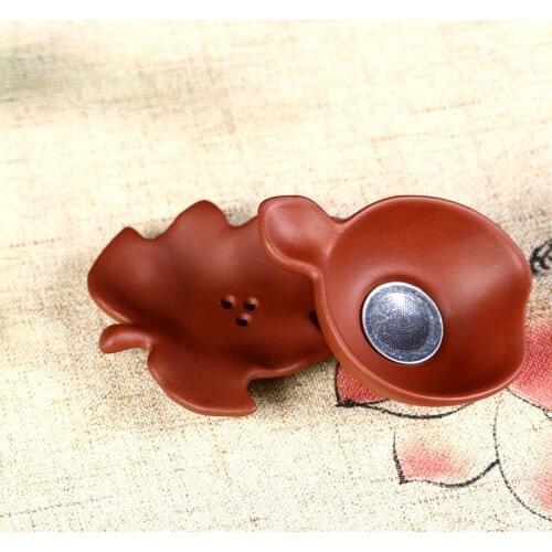 Pot of rhyme sea yixing kung fu tea set tea ceremony) purple sand pottery carved filtration filter of lotus leaf tea