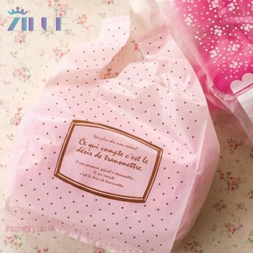 Zilue 100pcs/Lot Size 18*35cm(7"*14") Shopping Plastic Bag Handle Packaging Gift Small Dot Pink Colors Cute Bag Home Supplies