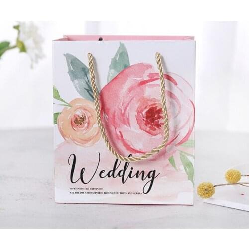 New Hot sale 5pcs 15x8x17.5cm flower European wedding candy box tote bag creative mori wedding gift bag box with hand gift bag