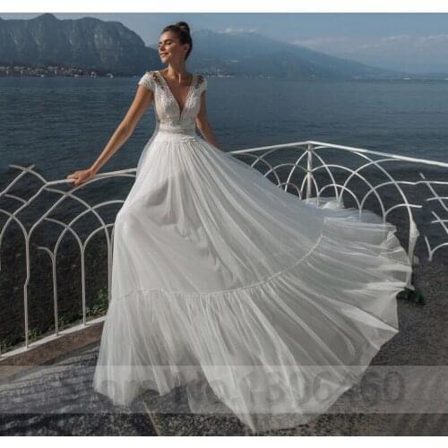 Cap Sleeve Plunging V Neck A Line Wedding Dress With Lace Pearls 2020 Bride Gown Button Back Robe de mariée