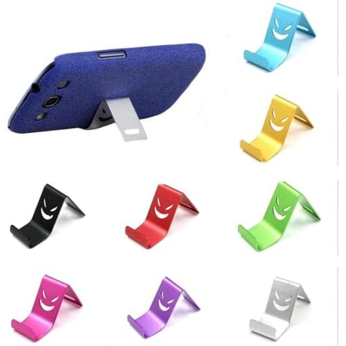 1 Piece Devil Smile Metal Bracket (Color Random) Evil Smail Fasion Phone Bracket Accessories For Mobile Phone Gift for Boyfriend