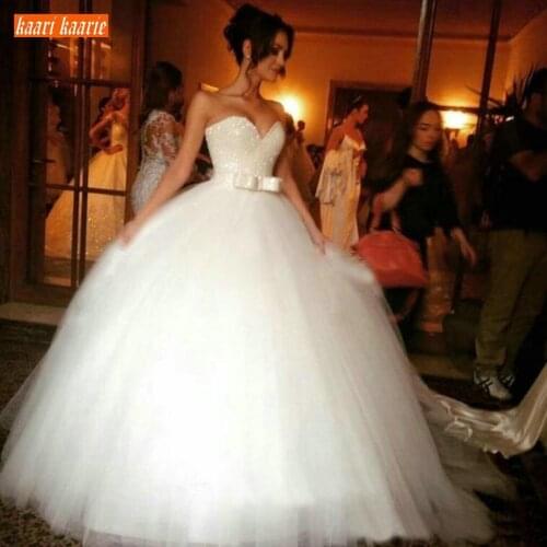 Sumptuous White Wedding Gowns Long 2020 Sweetheart Tulle Ball Gown Bridal Dresses Sequined Bow Fluffy Custom Made Wedding Dress