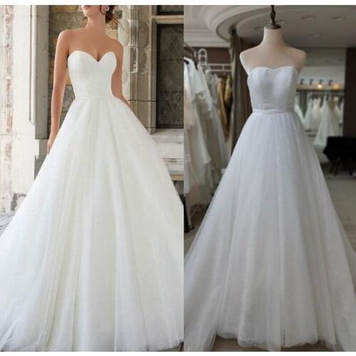 Floor Length Lace Appliques Sweep Train Long Sleeve V-Neck Wedding Dress Backless Backless Bridal Gowns Stunning High Quality