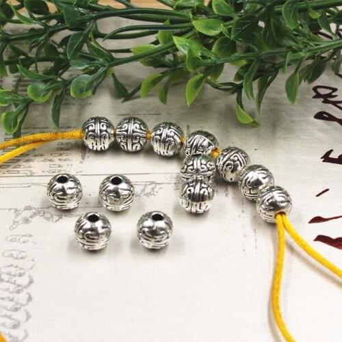 TOM YANG Metal Beads