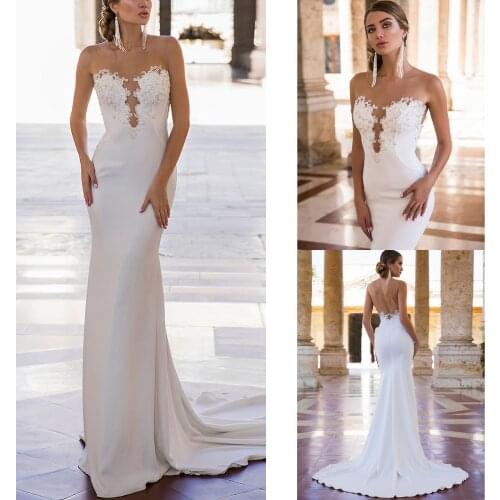 Sexy Backless Mermaid Wedding Dresses Illusion O Neck Off Shoulder Appliqued Luxury Crystal 2021 New Arrival Bridal Gowns