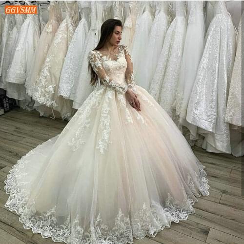 Luxury African O Neck Wedding Dresses Ivory Appliqued Lace Beaded Bridal Gowns Long Sleeves 2020 Custom Made White Wedding Dress