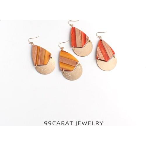 Qingdao jewelry 99 carat Bohemia water drop shape hollow out color splicing Wood Earrings exaggerated Earrings female WN