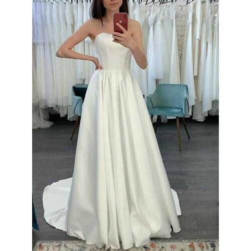 Elegant Long Sweetheart Satin Wedding Dresses with Pockets A-Line Ivory Floor Length Pleated Corset Back Bridal Gowns for Women