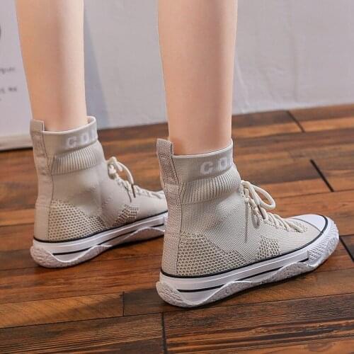 2021 spring new high-top net shoes female students Korean version Joker casual elastic socks shoes ins knitting