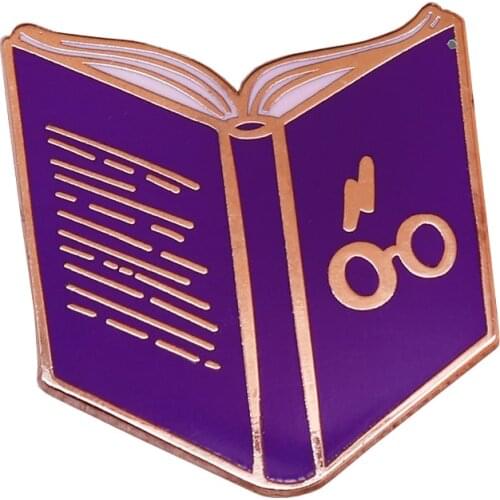 Sorcery book pin featuring a little pair of glasses and lightning bolt