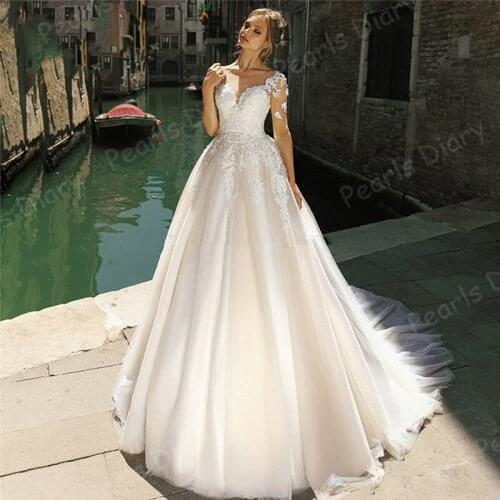 2020 Luxury Long Sleeves Wedding Dress Boho Sweep Train Bride Dresses Lace Appliques Illusion Bridal Gowns 2021 Robe De Mariage