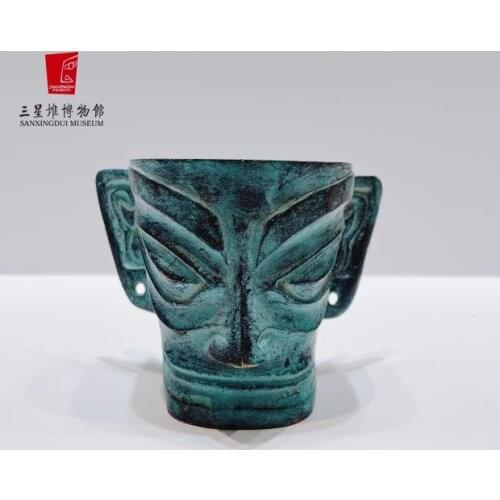 Three stars accompany the moon, [bronze mask] Museum mask is antique. bronzeware. Collect the decoration of living room and stud