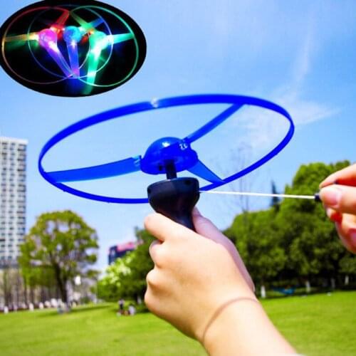 Funny Spinning Flyer Luminous Flying UFO LED Light Handle Flash Flying Toys for Kids Outdoor Game Color Random Gift