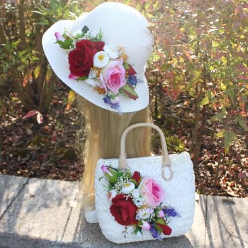 Hand-made Retro-Vintage handbags and flowers for holiday in summer, a set of straw-wrapped woven bags on beach
