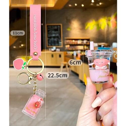 Creative Milk Bottle Crystal Milk Keychain Cute Hairy Ball Flowing Liquid Key Chain Computer Nail Clipper Key Chain Bag Pendant