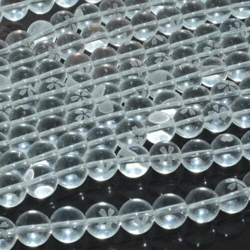 Natural Clean Quartz Round Beads With Flower Caving 10mm