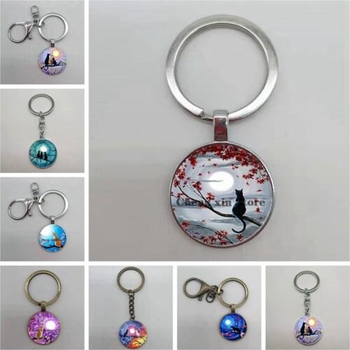 Popular/fashionable blue moon branch and cat glass round pendant keychain, male and female keychain