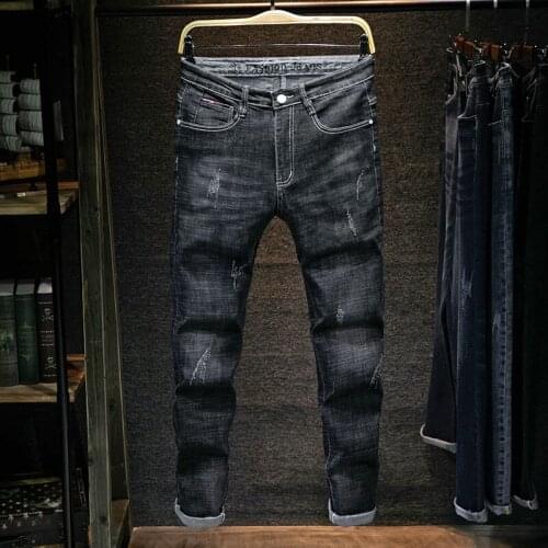 Mens jeans spring and summer four seasons jeans mens slim elastic black feet pants Korean trend casual straight trousers