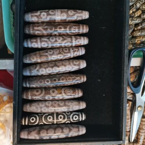 Piedras para bisuteria por mayor Real natural Tibet special cinnabar agate elephant male dzi large multi-eye agate gzi