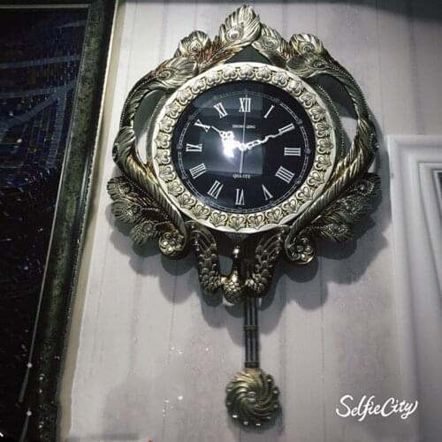 Peacock pendulum European pendulum creative luxury art decoration swing silent clock living room bedroom household