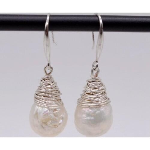 White baroque pearl earrings. Natural freshwater pearl. 925 sterling silver. Handmade original earrings. Female silver earrings