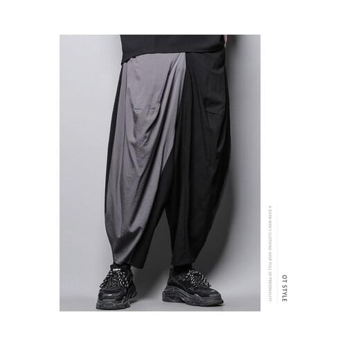 Dark personality design color matching asymmetric design casual pants nine-cent Harem pants men wide leg knickers