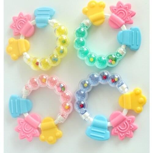 Cartoon Baby Teether Educational tools Ring Biting Baby Rattle Round Teether Toys Bed Silica Gel HandBell Educational Toys