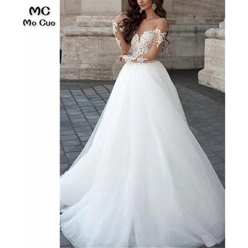 A line Long Sleeve Wedding Dresses Long Tulle White Lace Appliques Puffy Illusion Wedding Gowns
