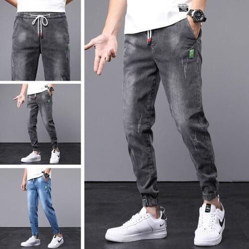 Summer mens pants 2021 new trendy brand ripped jeans mens slim feet Korean mens pants