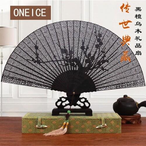 Chinese Fan Sub-ancient Wind Folding Hollow 7 Inch Ebony Wood Sandalwood Craft Gift To Send Foreigners Full Handmade Wedding