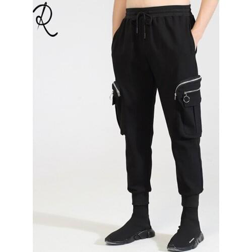 Autumn and winter fashion original dark brand personality pocket Zip Stitching Leisure bound feet feet small pants men