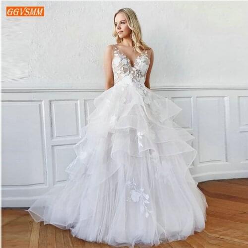 Trendy White Deep V neck Wedding Gowns Sexy Tulle Lace Applique Backless Bridal Dress Long 2020 Sleeveless Ivory Wedding Dresses