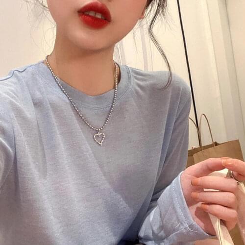 U-Magical Unique Design Hollow Out Metallic Love Heart Pendant Necklace for Women Simple Round Beads Necklace Fashion Jewelry