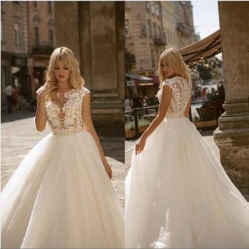 2021 Wedding Dresses Capped Sleeve Appliques Lace Beach Bridal Gowns Custom Made Button Back Sweep Train A-Line Wedding Dress