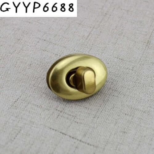 5sets 20sets Hight qulity Special gold oval lock for bag bright handbags hardware accessories leather twist